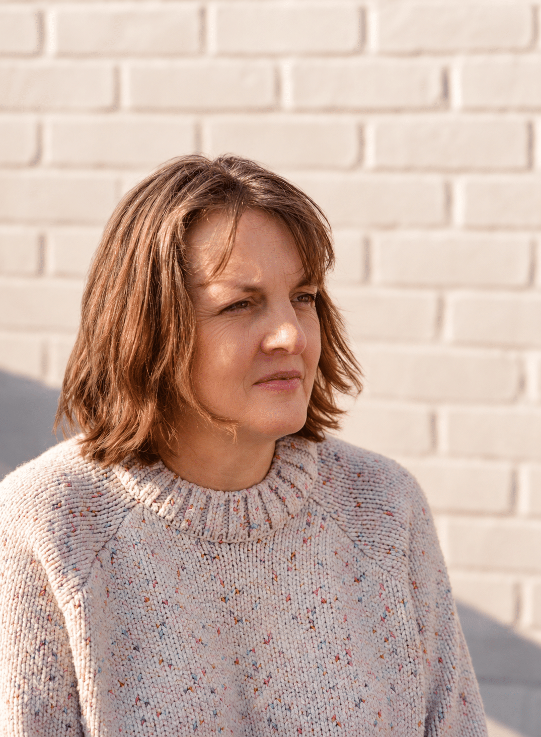 Xanthe, ADHD and Neurodivergent Coach at Squiggly Minds, photographed outdoors in natural light.